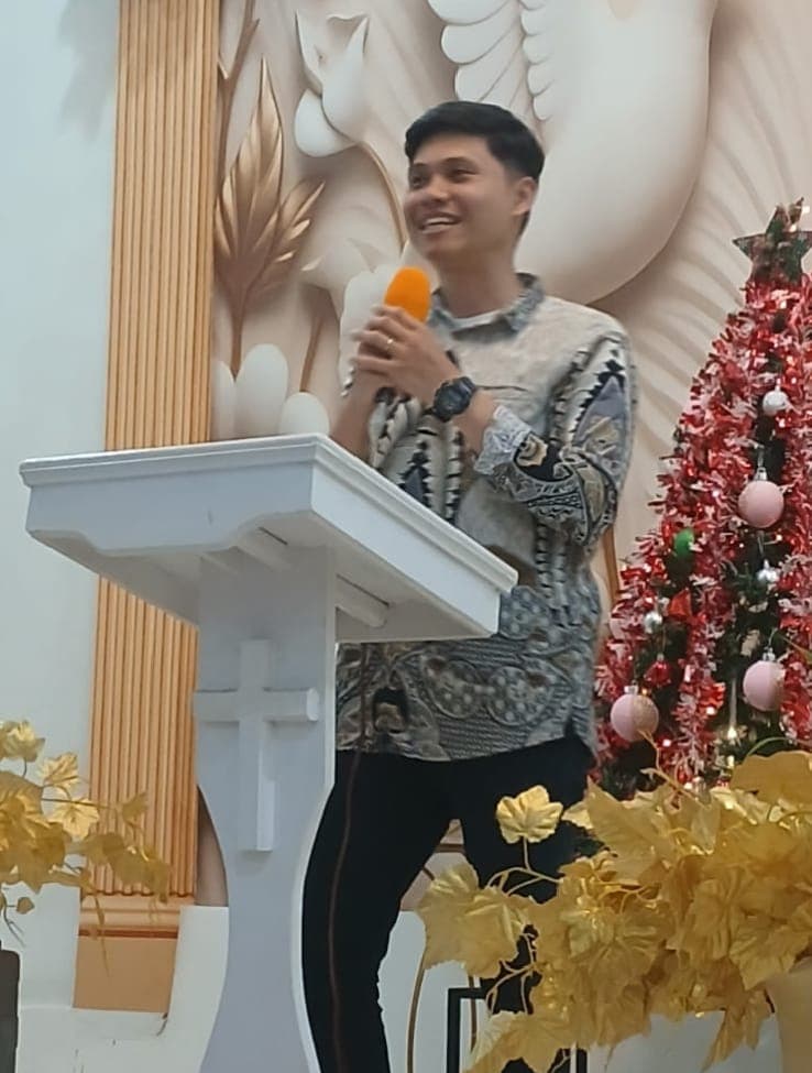 Pdt. Yohanes Mannopo, SE., S.Th